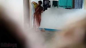 Beautiful Indian bhabhi undressing in the bathroom
