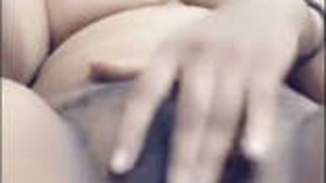 Explicit video of a sexy university woman pleasuring herself with her fuzzy and wet vagina