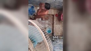 Beautiful nude auntie takes an outdoor bath and sings a song.