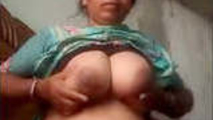 A hot Indian housewife flashing her tits and wet vagina.