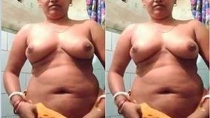 Porn video of college student undressing and exposing her body parts