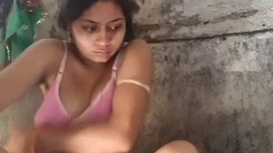 Young wife bathing in the river in the village