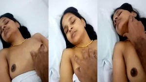 A beautiful Tamil woman exposing her breasts in a video sent by mobile phone.