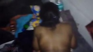 A hot Indian woman gets some action from a homeowner in an MMS video.