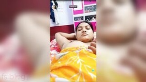 Married woman, desi housewife, and livecam user in an XXX video with a young man and her big tits.