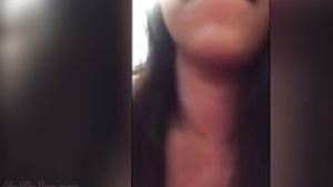 A young woman on the verge of womanhood pleases her boyfriend with self-pleasure via WhatsApp video.