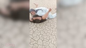 A friend of Desi Boy's has rough sex with a slut on the ground outdoors