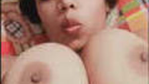 Beautiful Indian sister in video call showing her wet clinging clothes and her body.