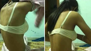 Indian girl satisfies her client in bed