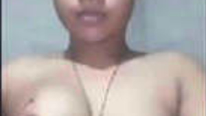 Fingers of a Desi Indian cutie are playing with her clitoris.