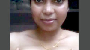 Beautiful big-boobed bhabi from a desi village shows off her curves.