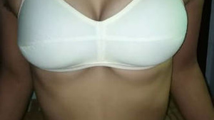 White bra-clad hot Indian girl shows off her curves.