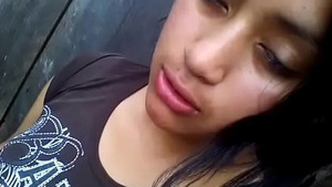 A teenage girl showing her nude body in a selfie.