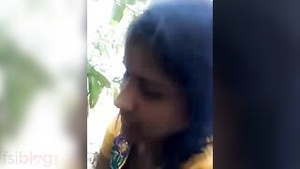 Village girl in explicit outdoor sexual video.