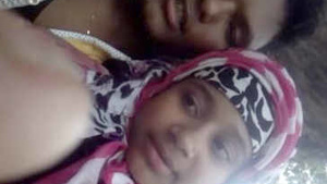 Young couple in the park having fun in bed