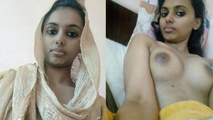 Beautiful woman showing her breasts on the video bed.