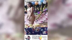 A beautiful woman of Indian descent strips naked for her loved one on his birthday.