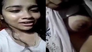 A Bangladeshi woman who helps her lover to start a conversation in a Bangladeshi village setting.