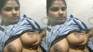 A hot Indian Bhabhi undressing and exposing her body while she is Horny and fingering herself.