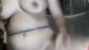 A horny housewife from the Indian subcontinent pleases herself.