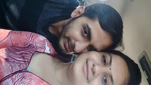 A lip kiss in a spicy Indian adult video.