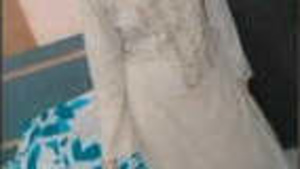 A beautiful Indian woman exposing her breasts during a video call.