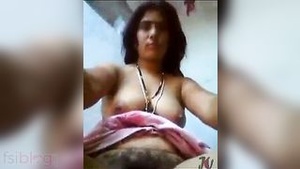A rural Bhabhi performs a live webcam show for her forbidden lover.