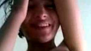 Home video of a young woman with large breasts diagnosed with cancer and getting intimate.