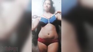 A hot Indian video shows a beautiful woman stripping and exposing her beautiful body.