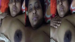 Big-boobed woman exposes her breasts in front of the camera