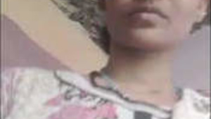 Virgin with a shaved pussy enjoys fingering.