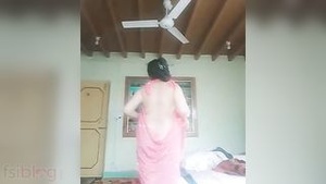 Beautiful video of an aunt stripping and exposing her beautiful big breasts.