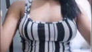 A hot Indian girl performing live on camera.