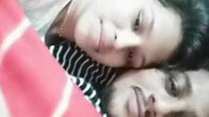 Video call between an Indian couple includes kissing and breast sucking