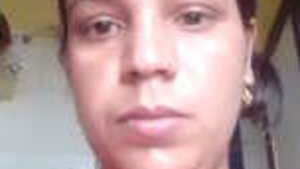 Hot Indian housewife showing her assets and performing solo pleasure