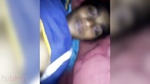 Young Indian woman pleases herself by rubbing her hairy vagina with her fingers in front of the camera.