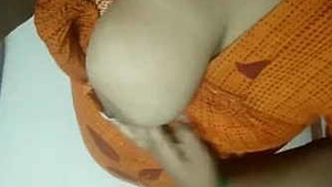 A sexy girl from Tamil Nadu self-examination of her breasts.