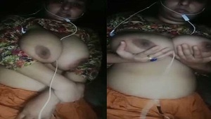 A beautiful woman from a Pakistani village flaunts her large breasts.