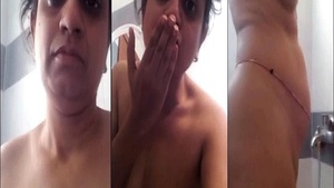 A hot wife strips and performs for her lover by webcam.