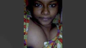 Pretty Indian girl flaunts her large breasts