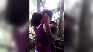 Lovebird’s bliss:-Amateur couple SHARES passionate kiss at a romantic spot.