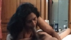 A mature Indian woman gives a great blow job to her lover who is not her husband.