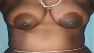 A beautiful woman from Tamil Nadu poses naked for a photo.