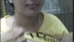 Beautiful Indian housewife shows her large breasts.