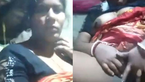A married woman from rural Bangladesh masturbates and records herself while doing so.