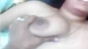 XXX Indian sex movie with a naughty auntie and her lover on the side.