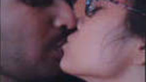 Desi Bhabhi's passionate kiss and love making scene