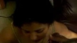 A wife who is being unfaithful to her husband gets a facial from her lover.