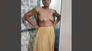 Sexy married woman undressing as recorded by her husband