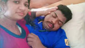 A beautiful Indian wife undresses for her former lover.